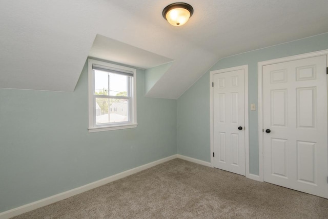 3552 S Pine Ave, Milwaukee, WI 53207 - bonus room featuring vaulted ceiling, carpet flooring, and baseboards