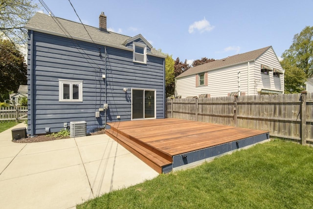 3552 S Pine Ave, Milwaukee, WI 53207 - back of property featuring a chimney, a deck, central air condition unit, and a patio