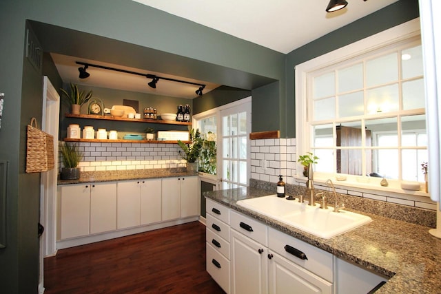 116 N 85th St, Wauwatosa, WI 53226 - kitchen with backsplash, white cabinets, a sink, open shelves, and dark wood-style flooring