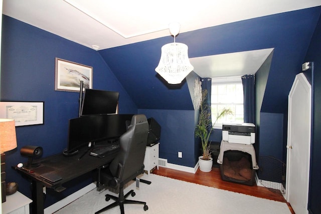 116 N 85th St, Wauwatosa, WI 53226 - office area featuring vaulted ceiling, wood finished floors, and baseboards