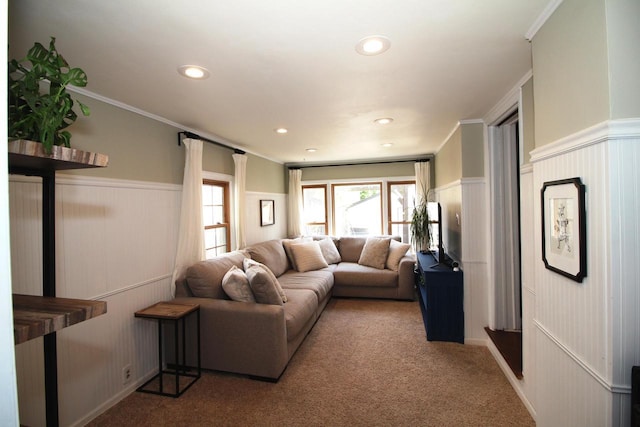 116 N 85th St, Wauwatosa, WI 53226 - carpeted living room with a wainscoted wall, plenty of natural light, a decorative wall, and ornamental molding