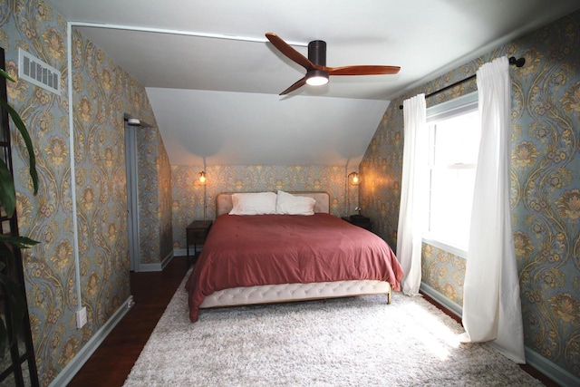 116 N 85th St, Wauwatosa, WI 53226 - bedroom with baseboards, wood finished floors, lofted ceiling, wallpapered walls, and ceiling fan