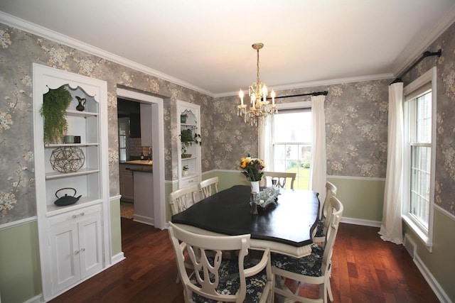116 N 85th St, Wauwatosa, WI 53226 - dining area with a chandelier, dark wood-style floors, ornamental molding, wallpapered walls, and baseboards