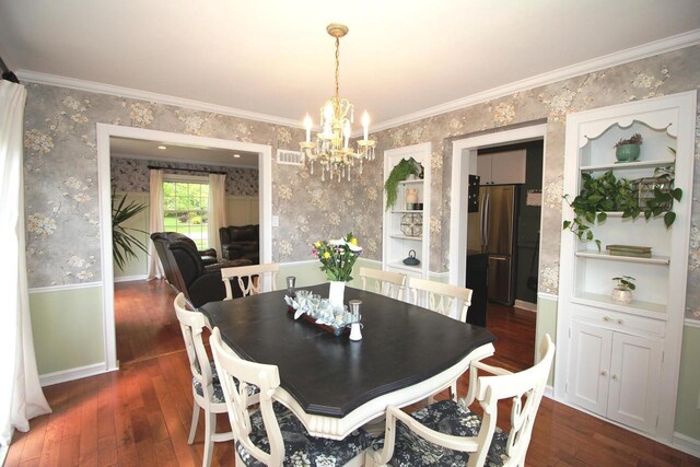 116 N 85th St, Wauwatosa, WI 53226 - dining space featuring wallpapered walls, a chandelier, dark wood finished floors, baseboards, and ornamental molding