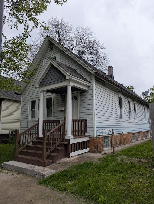 110 W Center St, Milwaukee, WI 53212 - view of front of home featuring a chimney