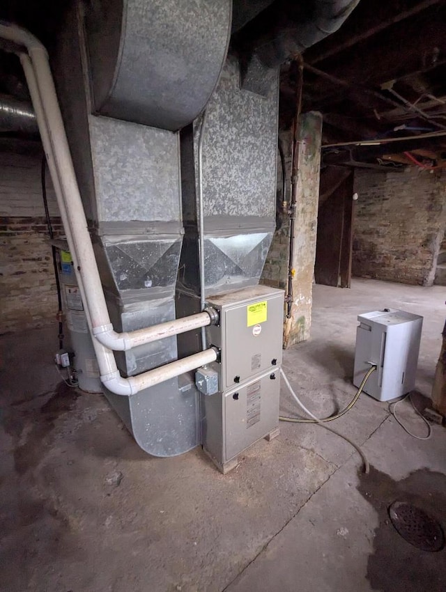 110 W Center St, Milwaukee, WI 53212 - utility room with heating unit and water heater