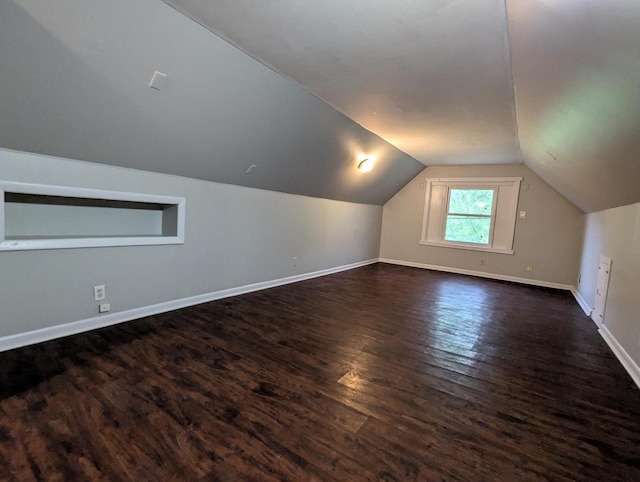 110 W Center St, Milwaukee, WI 53212 - bonus room with dark wood-style flooring, baseboards, and vaulted ceiling