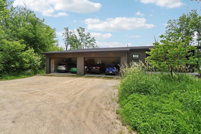 303 Craig Rd, Edgerton, WI 53534 - garage featuring dirt driveway