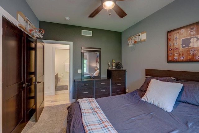 5508 Midmoor Rd, Monona, WI 53716 - bedroom with carpet floors, ensuite bath, and a ceiling fan