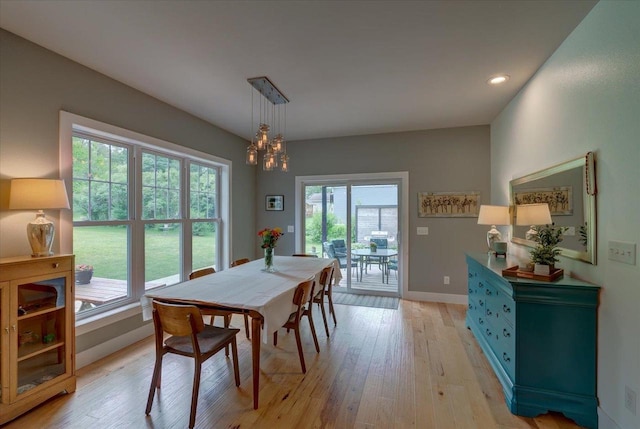 5508 Midmoor Rd, Monona, WI 53716 - dining area with a chandelier, light wood-type flooring, baseboards, and recessed lighting