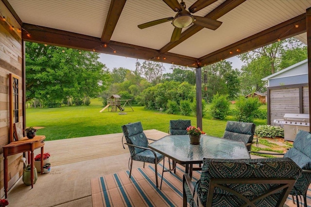5508 Midmoor Rd, Monona, WI 53716 - view of patio featuring a playground, a ceiling fan, outdoor dining area, area for grilling, and a wooden deck