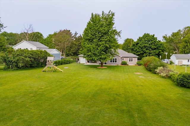 5508 Midmoor Rd, Monona, WI 53716 - view of grassy yard featuring a playground