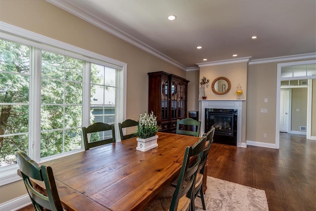 1834 Camelot Dr, Madison, WI 53705 - dining space featuring a high end fireplace, dark wood finished floors, ornamental molding, recessed lighting, and baseboards