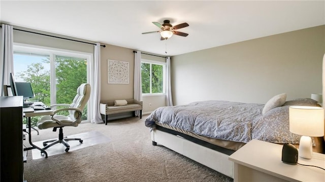 1604 Lake Rd, Altoona, WI 54720 - bedroom with carpet, a desk, and a ceiling fan