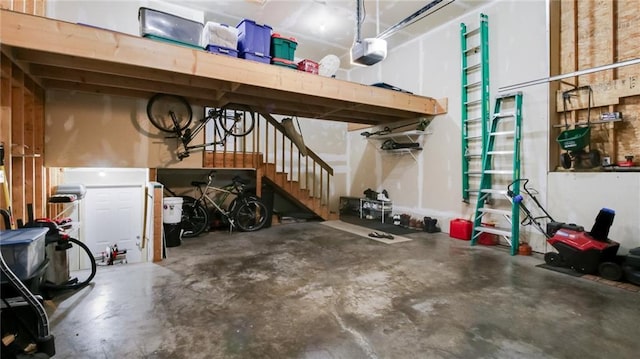1604 Lake Rd, Altoona, WI 54720 - garage featuring a garage door opener