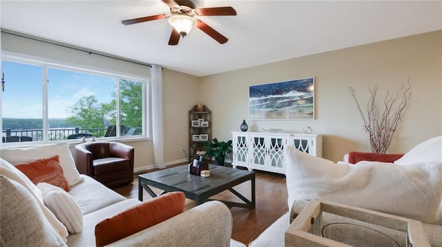 1604 Lake Rd, Altoona, WI 54720 - living room with a ceiling fan, wood finished floors, and baseboards