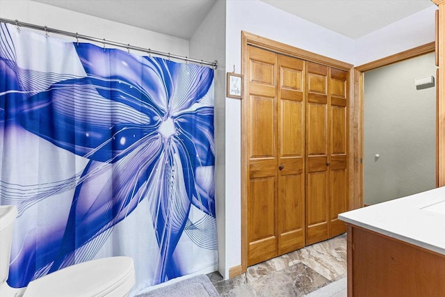 1110 Stillmeadow Ln, Menasha, WI 54952 - bathroom with toilet, vanity, a shower with shower curtain, and marble finish floors