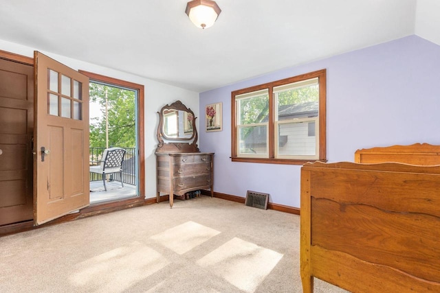 813 W Summer St, Appleton, WI 54914 - carpeted bedroom featuring access to outside, multiple windows, and baseboards