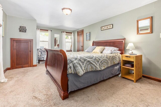 813 W Summer St, Appleton, WI 54914 - bedroom with carpet and baseboards