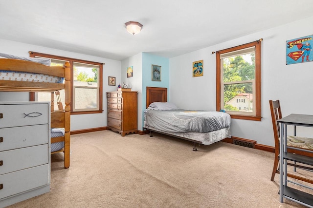 813 W Summer St, Appleton, WI 54914 - bedroom featuring carpet flooring, multiple windows, and baseboards