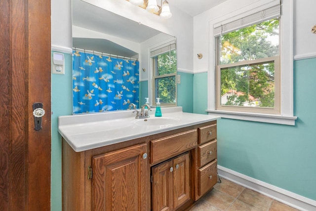 813 W Summer St, Appleton, WI 54914 - bathroom featuring vanity and baseboards
