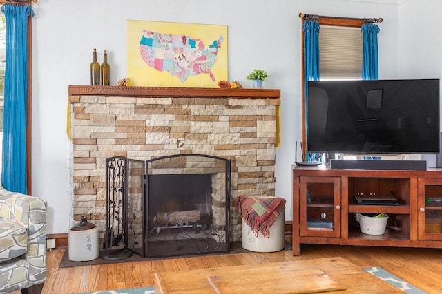 813 W Summer St, Appleton, WI 54914 - living area featuring wood finished floors and a fireplace