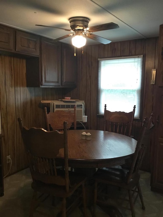 N7777 Kitty Dell Rd, Crivitz, WI 54114 - dining area with wood walls and a ceiling fan
