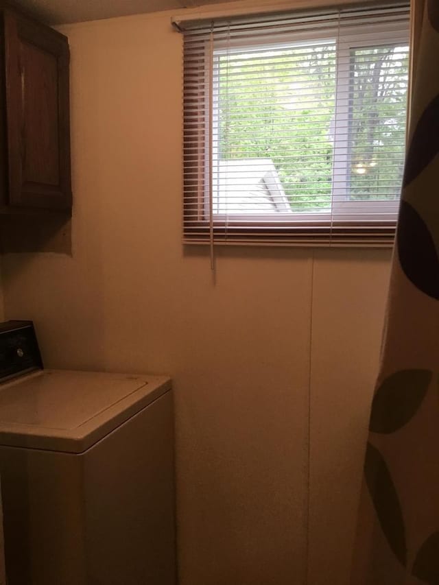 N7777 Kitty Dell Rd, Crivitz, WI 54114 - laundry room with washer / dryer and cabinet space