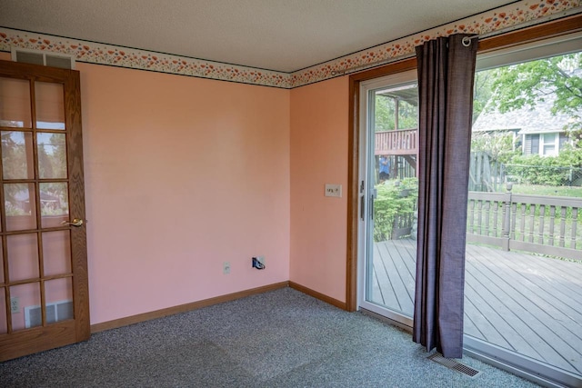 706 Tremont St, Mauston, WI 53948 - entryway featuring carpet and baseboards