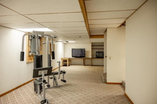 706 Tremont St, Mauston, WI 53948 - workout room with carpet floors, baseboards, and a drop ceiling