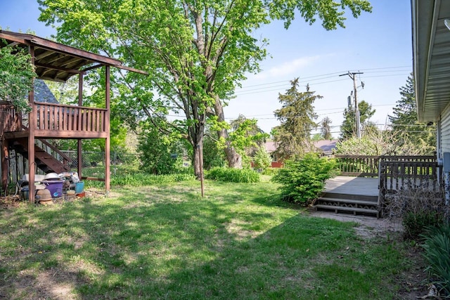 706 Tremont St, Mauston, WI 53948 - view of yard with a deck and stairway
