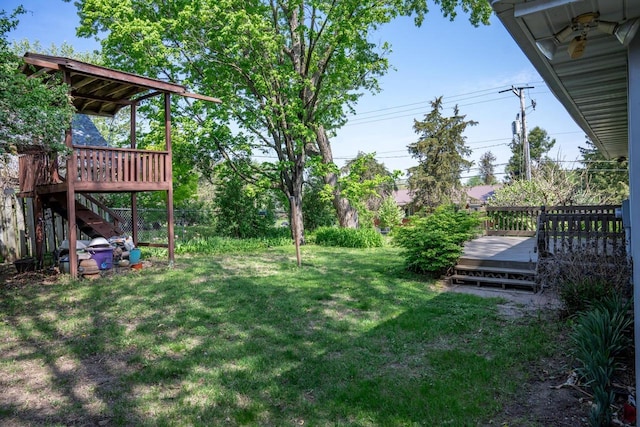 706 Tremont St, Mauston, WI 53948 - view of yard featuring a wooden deck and stairway