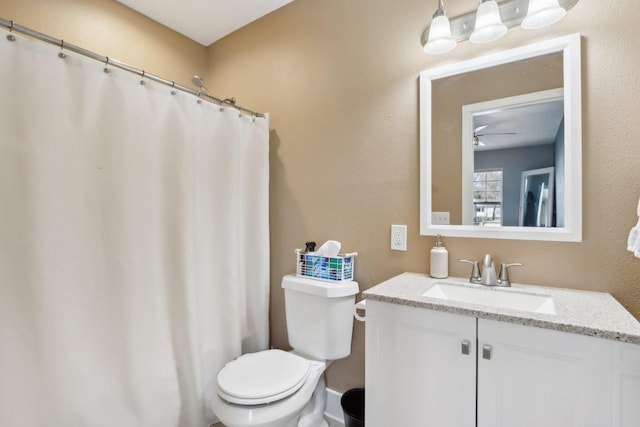 707 E Roland St, Oconomowoc, WI 53066 - full bathroom featuring toilet, vanity, ceiling fan, and a shower with curtain