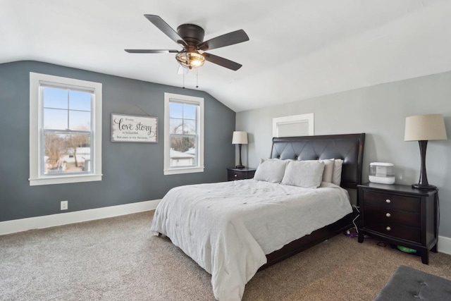 707 E Roland St, Oconomowoc, WI 53066 - carpeted bedroom featuring vaulted ceiling, baseboards, and ceiling fan