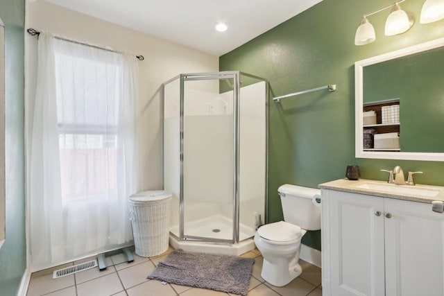 707 E Roland St, Oconomowoc, WI 53066 - full bath featuring toilet, a stall shower, vanity, and tile patterned floors
