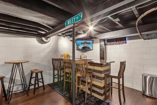 707 E Roland St, Oconomowoc, WI 53066 - dining space featuring wood finished floors and a dry bar