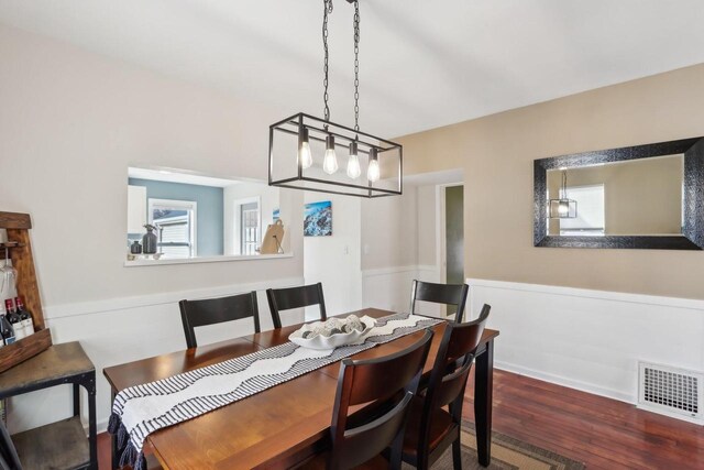 707 E Roland St, Oconomowoc, WI 53066 - dining space with dark wood-type flooring
