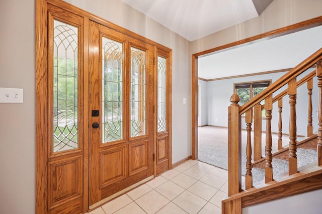 W197S8409 Plum Creek Blvd, Muskego, WI 53150 - foyer entrance with light tile patterned floors, stairway, light carpet, and baseboards