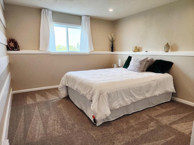 326 N 15th St, Oostburg, WI 53070 - bedroom with carpet floors, baseboards, and a textured wall