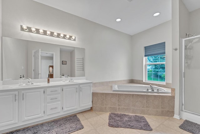 10245 66th Ave Unit 2Bb, Pleasant Prairie, WI 53158 - bathroom with a shower stall, a garden tub, double vanity, tile patterned floors, and recessed lighting