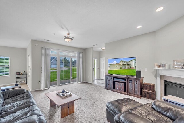 10245 66th Ave Unit 2Bb, Pleasant Prairie, WI 53158 - living area featuring a fireplace, carpet floors, baseboards, and recessed lighting