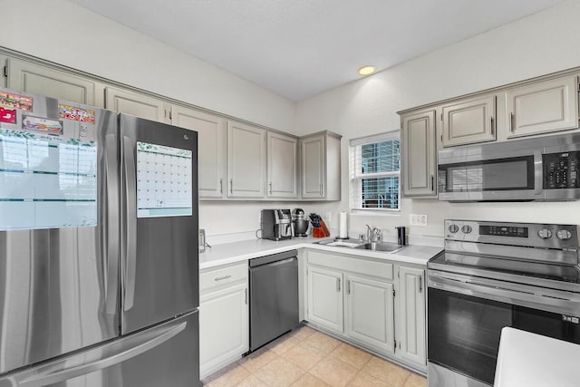 10245 66th Ave Unit 2Bb, Pleasant Prairie, WI 53158 - kitchen with stainless steel appliances, a sink, light countertops, and recessed lighting