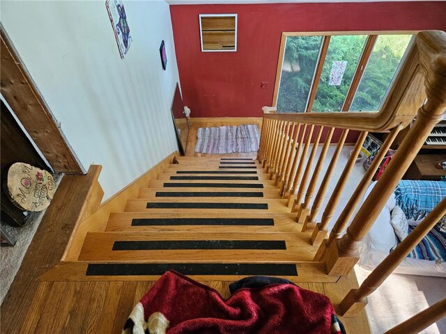 N10449 State Road 25, Wheeler, WI 54772 - stairway featuring baseboards