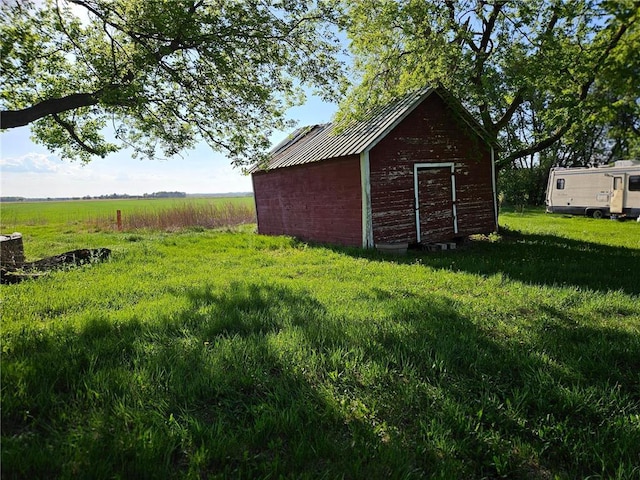 N10449 State Road 25, Wheeler, WI 54772 - view of yard featuring an outbuilding