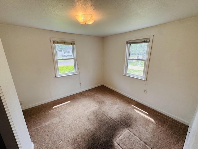 1344 Mckinley Ave, Beloit, WI 53511 - unfurnished room featuring carpet flooring and baseboards