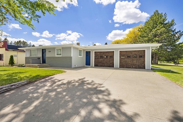3531 N Richmond St, Appleton, WI 54911 - single story home with driveway, a front yard, and an attached garage