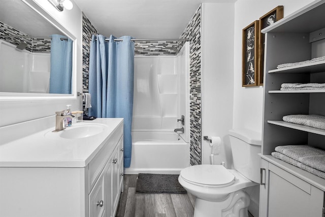 3531 N Richmond St, Appleton, WI 54911 - full bathroom with vanity, toilet, shower / tub combo with curtain, and wood finished floors