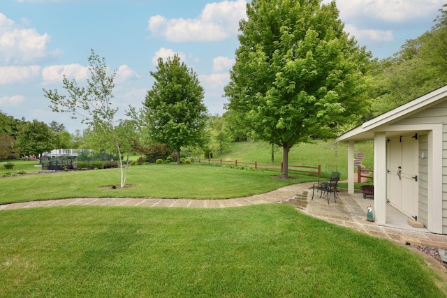 504 Sand Dr, West Bend, WI 53095 - view of yard featuring a patio