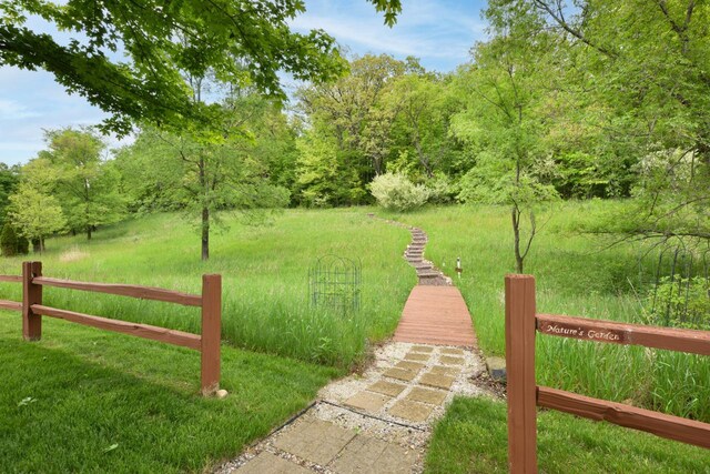 504 Sand Dr, West Bend, WI 53095 - view of yard with a view of trees