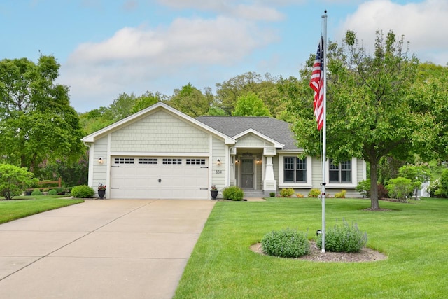 504 Sand Dr, West Bend, WI 53095 - ranch-style home featuring driveway, a garage, and a front yard